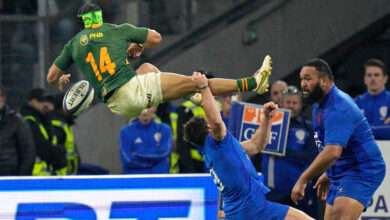 South Africa wing Cheslin Kolbe tackled in the air against France PA